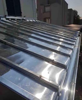 Terrasse à tasseaux en zinc + pose de gouttière zinc