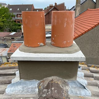 Réfection cheminée : remplacement des pots et de la plaque béton + cimentage périphérique